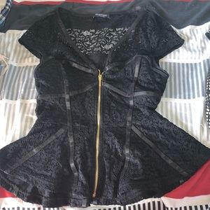 Bebe’s black blouse